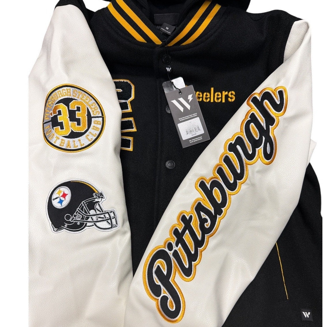 Pittsburgh Steelers varsity jacket for women by DSG, medium size, featuring team logo and varsity style details.