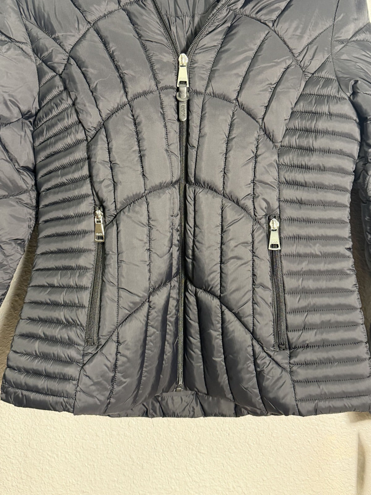 Black DKNY women's hooded quilted puffer jacket with front zipper and side pockets, size small, new with tags.
