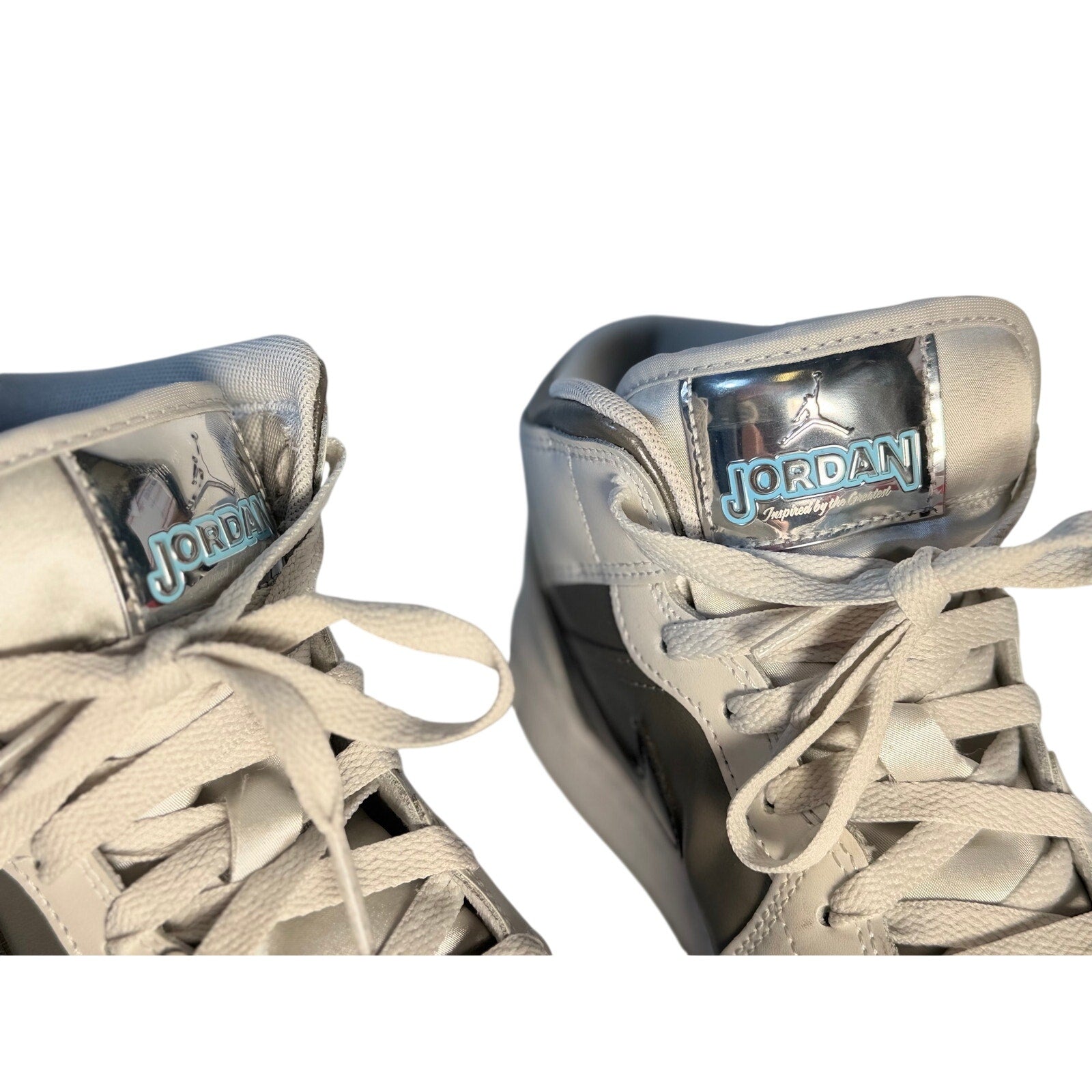 Air Jordan 1 Mid GS sneakers in white, gray, and black with youth size 7Y, featuring classic Nike Jordan design
