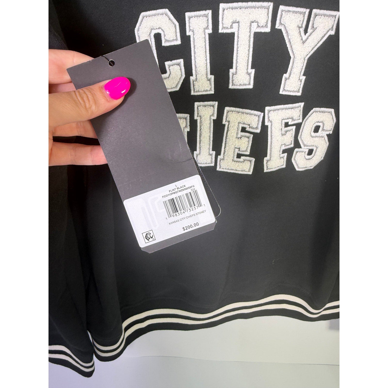 Stoney Clover Kansas City Chiefs women's varsity jacket in black, large size, new with tags, featuring team logo and classic varsity style.
