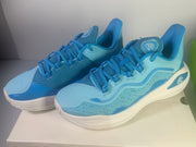 Blue Under Armour Curry Flow basketball shoes for youth, size 7Y, featuring athletic design and supportive features.