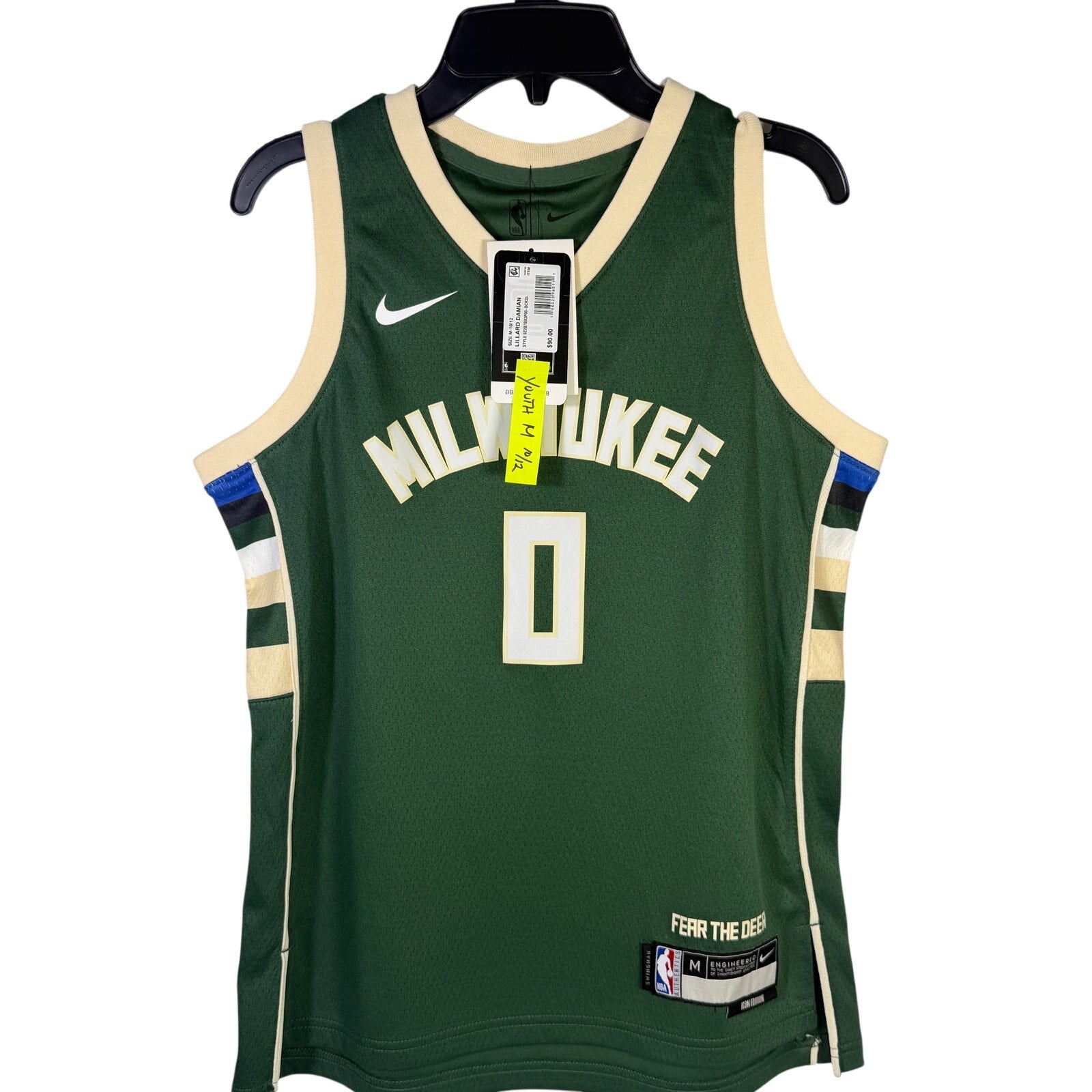 Nike Milwaukee Bucks Damian Lillard #0 Swingman youth jersey in green, size M, featuring team logo and player name.