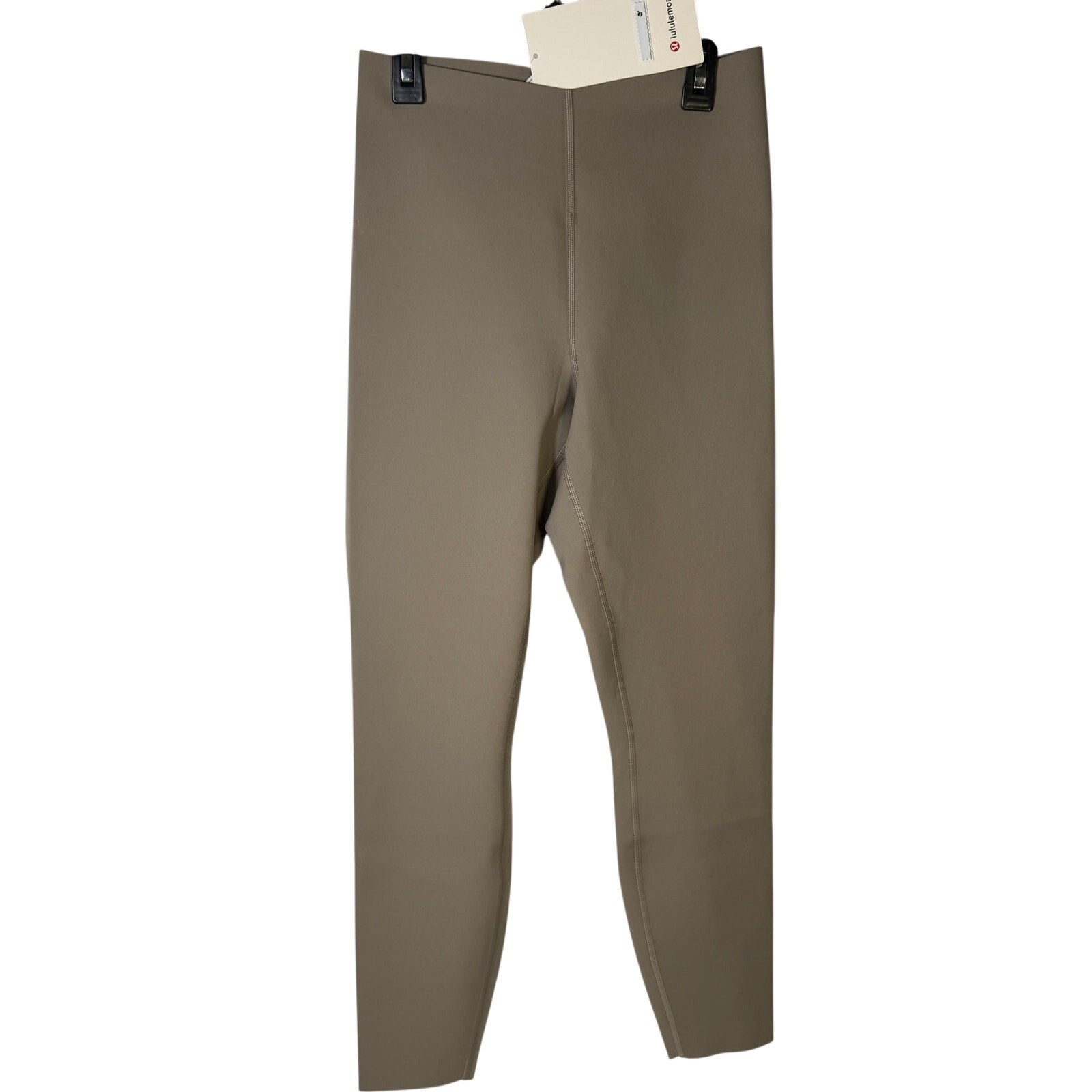 Lululemon Glow Up super-high-rise leggings in taupe gray, size 4, featuring a sleek, fitted design and 25-inch length.