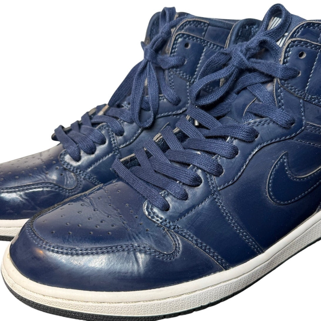 Men's Air Jordan 1 Retro High OG DSM sneakers in Obsidian and White, featuring a high-top design by Barry's X Nike.