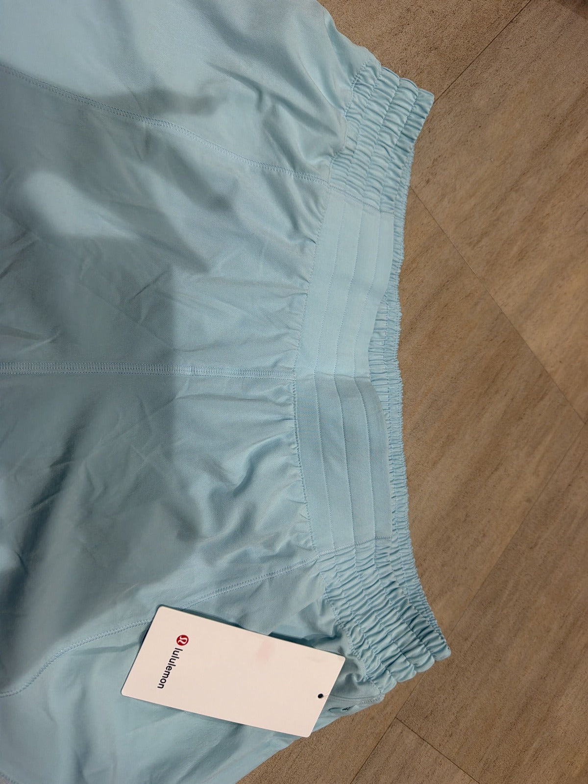 Lululemon Hotty Hot HR 4-inch lined women's shorts in foam blue, high-rise, size 14, athletic activewear.