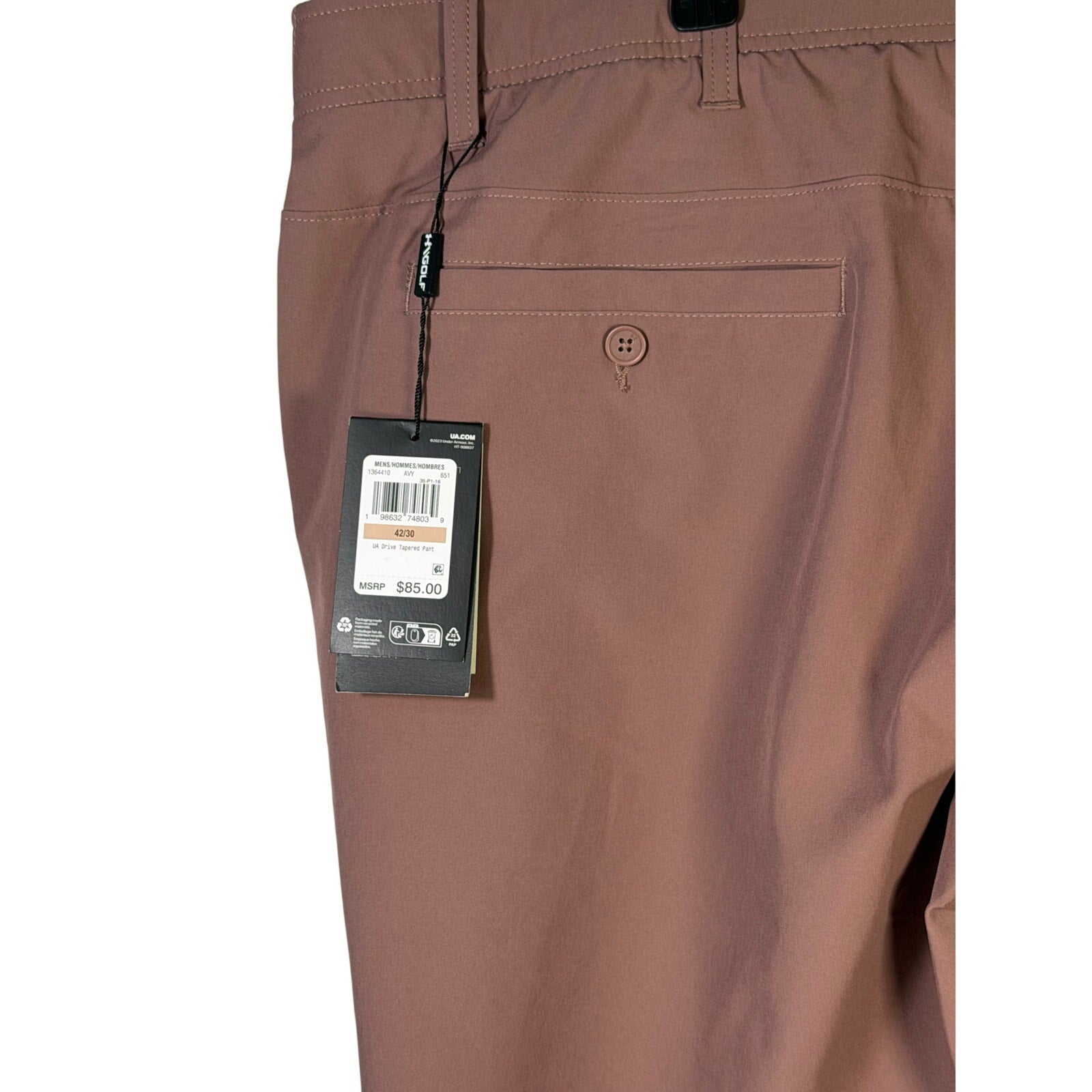 Under Armour men's UA Drive Tapered golf pants in maroon mist, size 42x30, showing the tapered fit and fabric details.