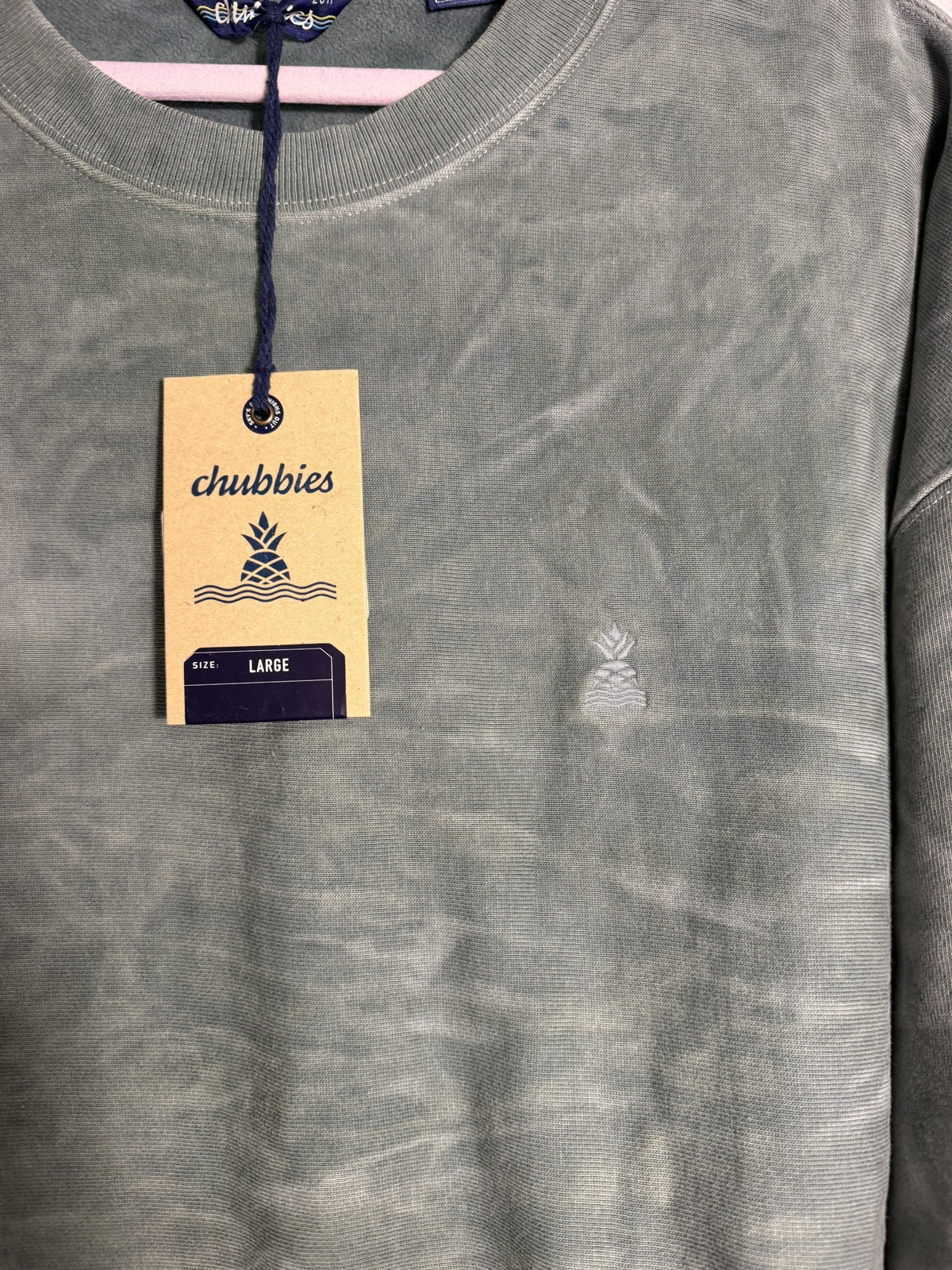 Men's green Chubbies Marshland Pebble Wash crewneck sweatshirt with a relaxed fit, displayed on a hanger.