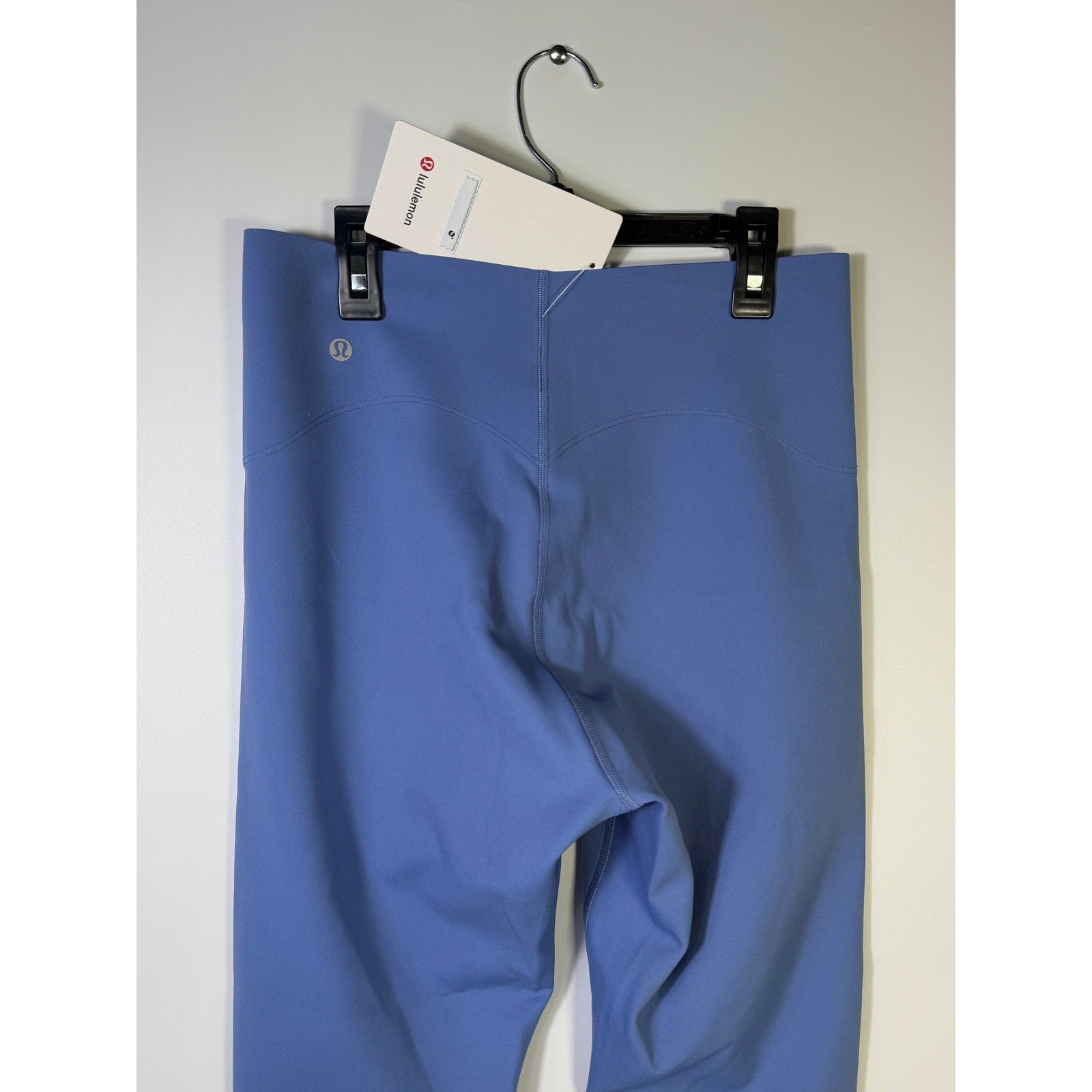 Lululemon Glow Up super-high-rise leggings in prep blue, size 6, showing the fit and vibrant color of the athletic tights.