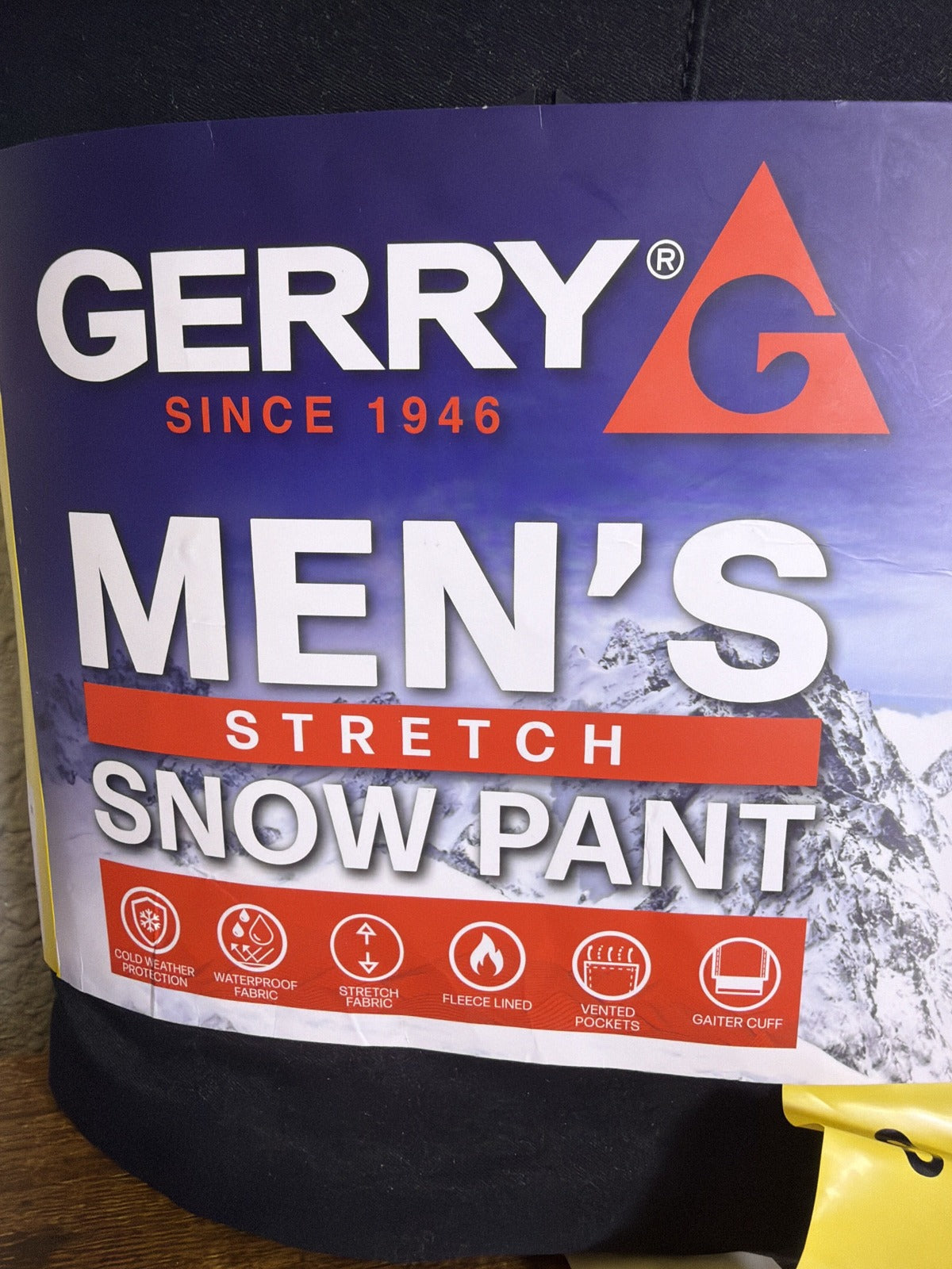 Black Gerry men's stretch snow pants with waterproof fleece lining, designed for skiing, size small, shown on a hanger