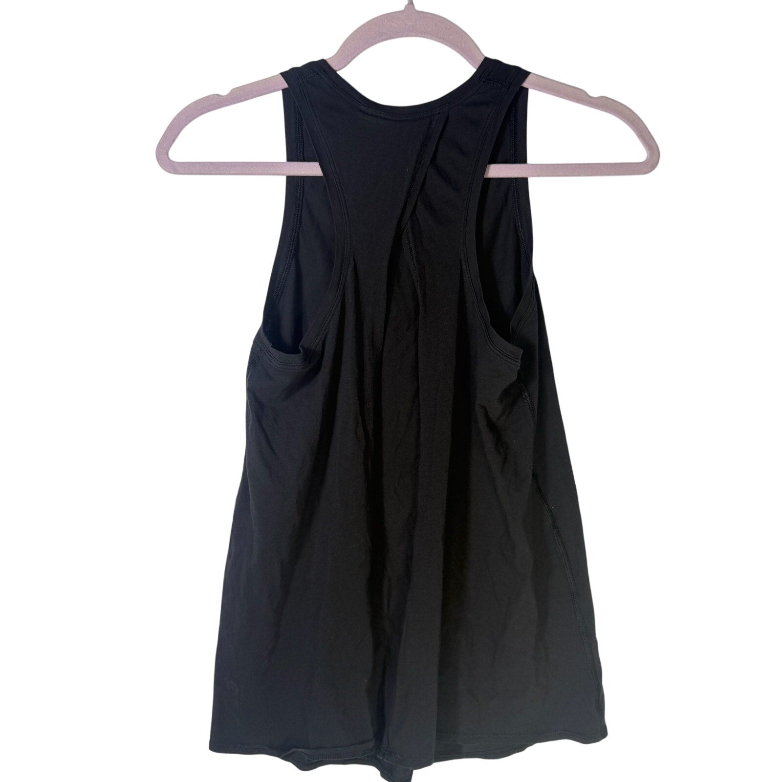 Black Lululemon women's high-neck open-back athletic tank top, size 4, featuring a sleek design and breathable fabric.