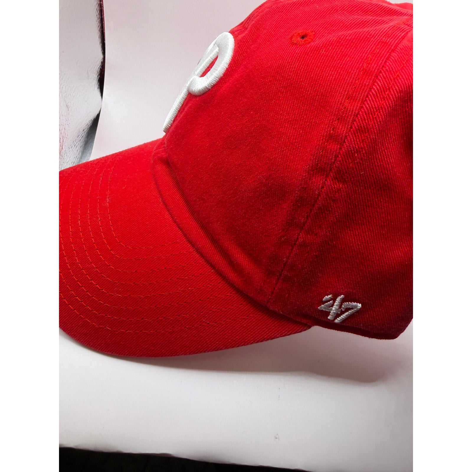 Philadelphia Phillies MLB 47 red adjustable strapback hat with USA flag design, one size fits most.