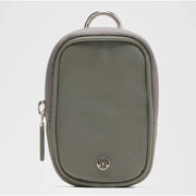 Lululemon gray and green clippable nano pouch handbag with zip closure, new with tags, compact and versatile for everyday use