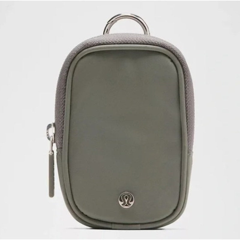 Lululemon gray and green clippable nano pouch handbag with zip closure, new with tags, compact and versatile for everyday use