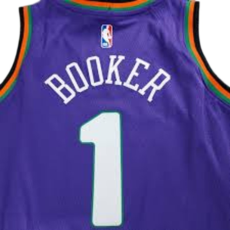 Nike Phoenix Suns Devin Booker #1 youth purple jersey, size L 14/16, featuring team logo and player name on the front.