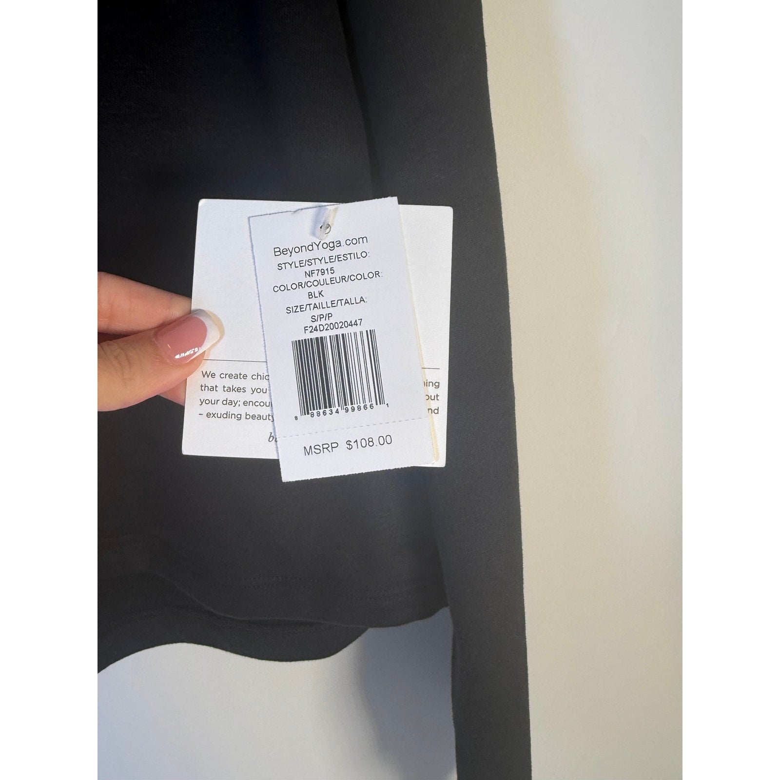 Black Beyond Yoga cropped hoodie for women, small size, casual pullover sweatshirt with a relaxed fit and soft fabric.