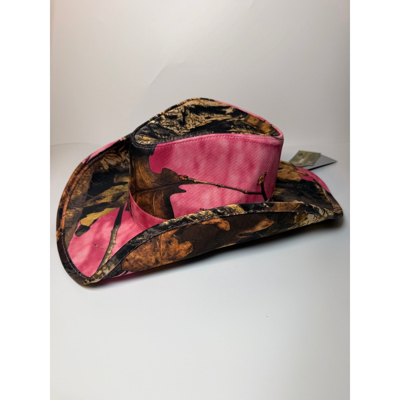 Peter Grimm Mossy Oak women’s pink camo western cowboy hat with snap-up brim, stylish outdoor headwear.