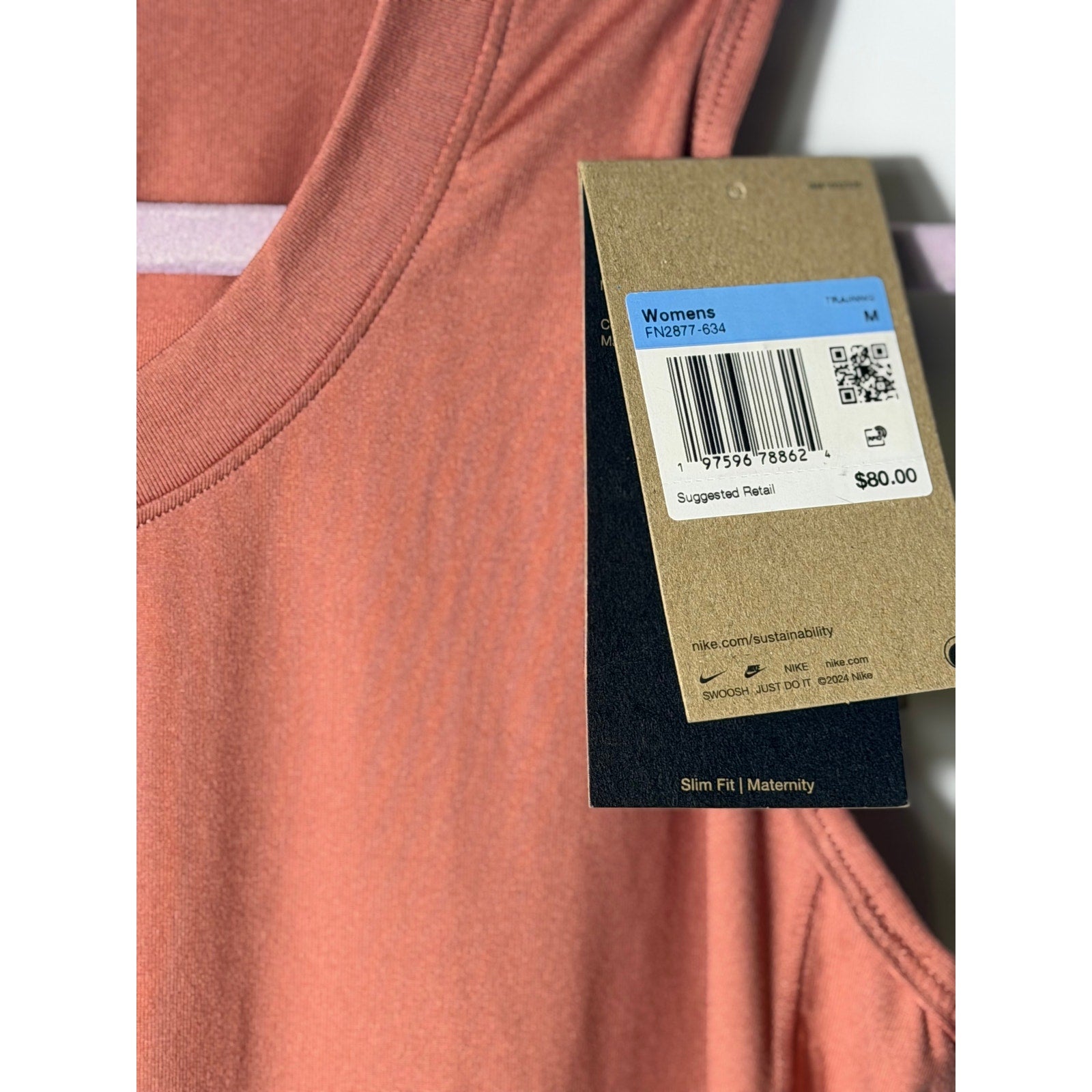 Nike Dri-FIT maternity sleeveless midi dress for women, pink, medium size, comfortable and stylish for active pregnancy wear.