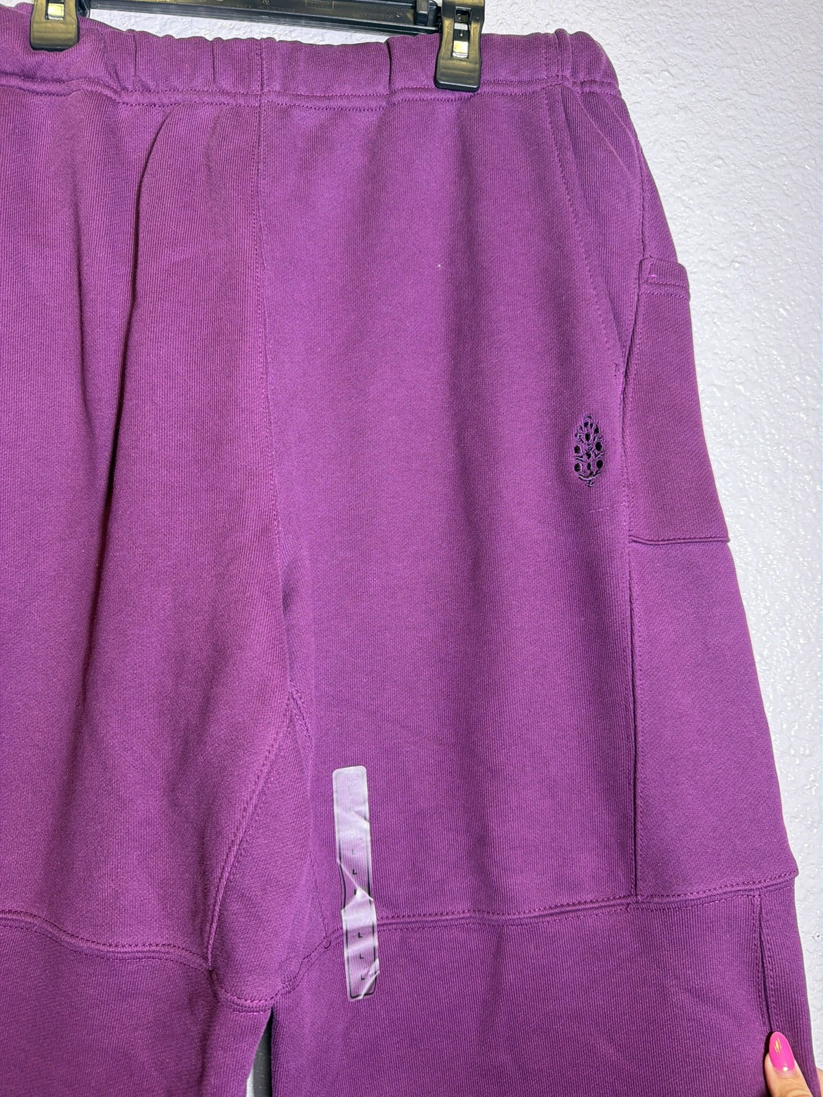 Purple FP Movement Free People women's sweatpants, top score barrel style, relaxed fit with elastic waistband and cuffed ankles.