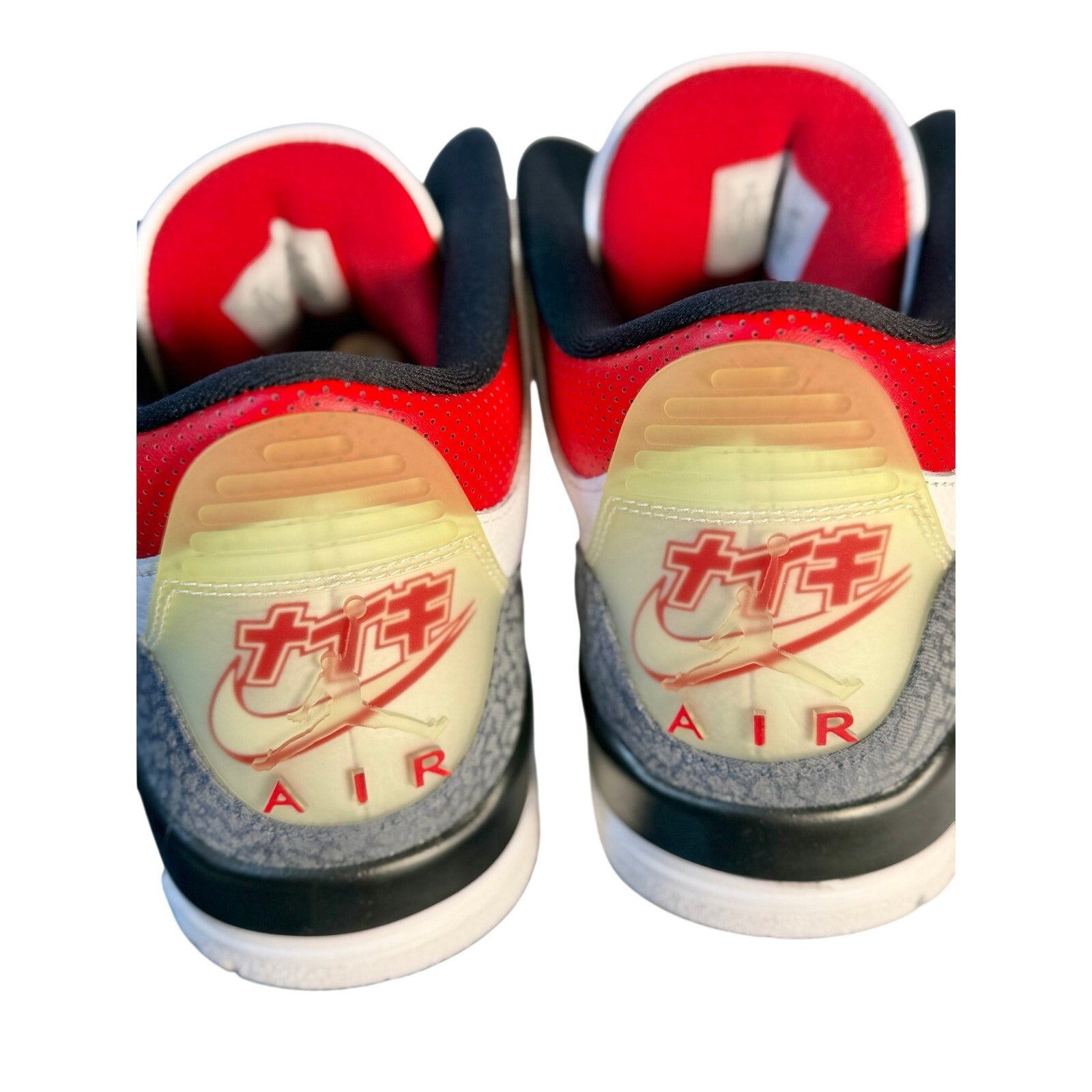 White Air Jordan 3 Retro sneakers with cement details, men's athletic shoes, showcasing the iconic Jordan brand design and style.