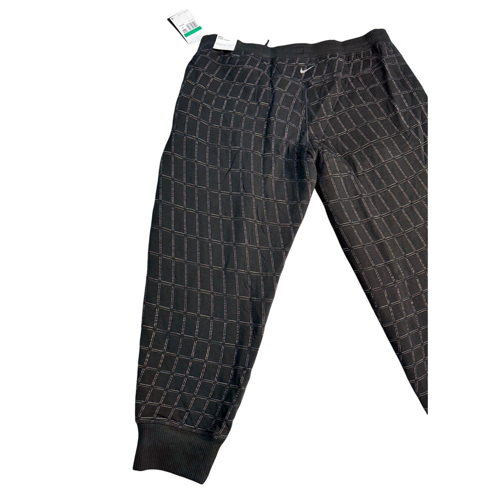 Black Nike Yoga Luxe Dri-FIT Grid jogger pants for women, XL size, displayed flat showing waistband and tapered legs.