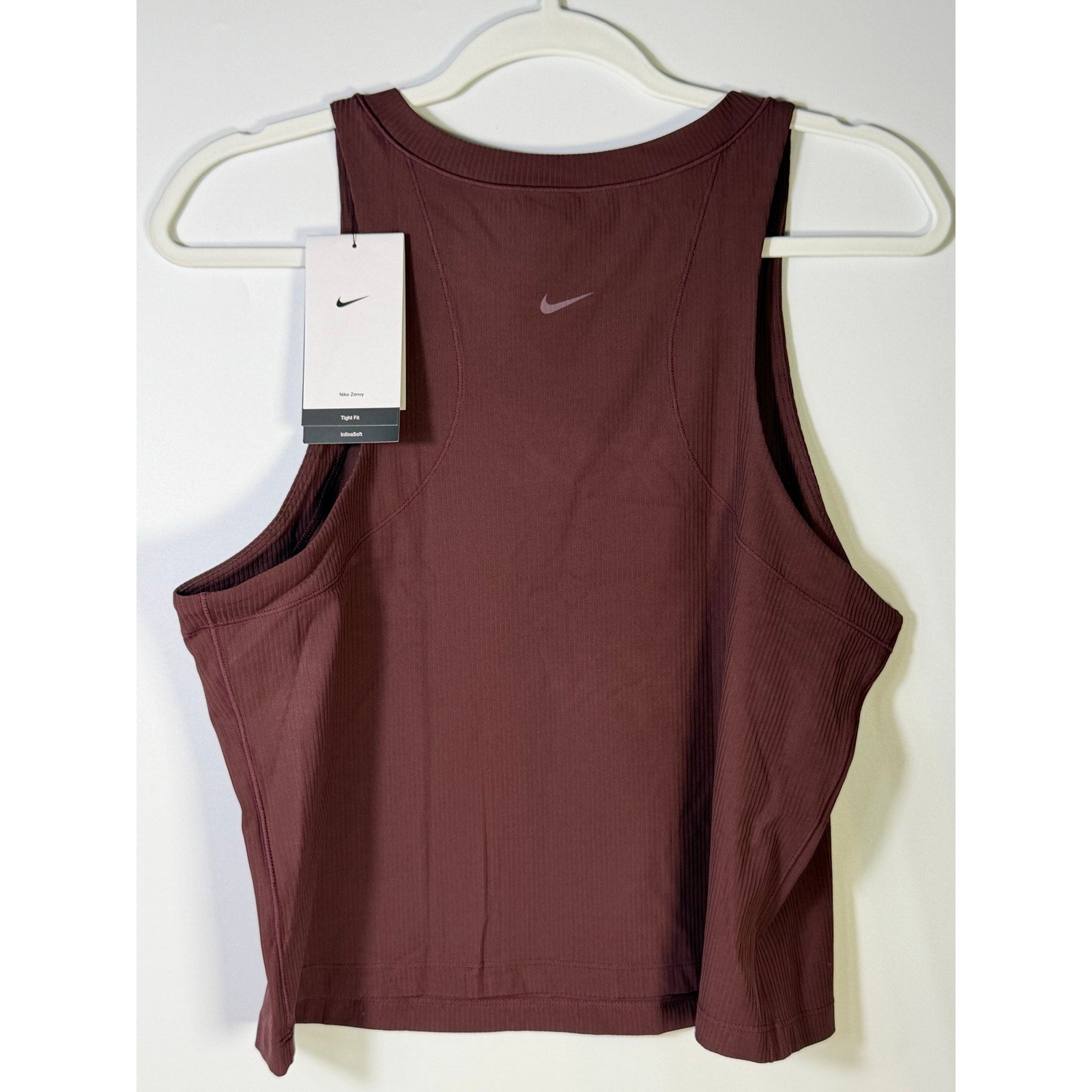 Nike women's brown ribbed cropped muscle tank top, size L, showing front view with sleeveless design and fitted style.