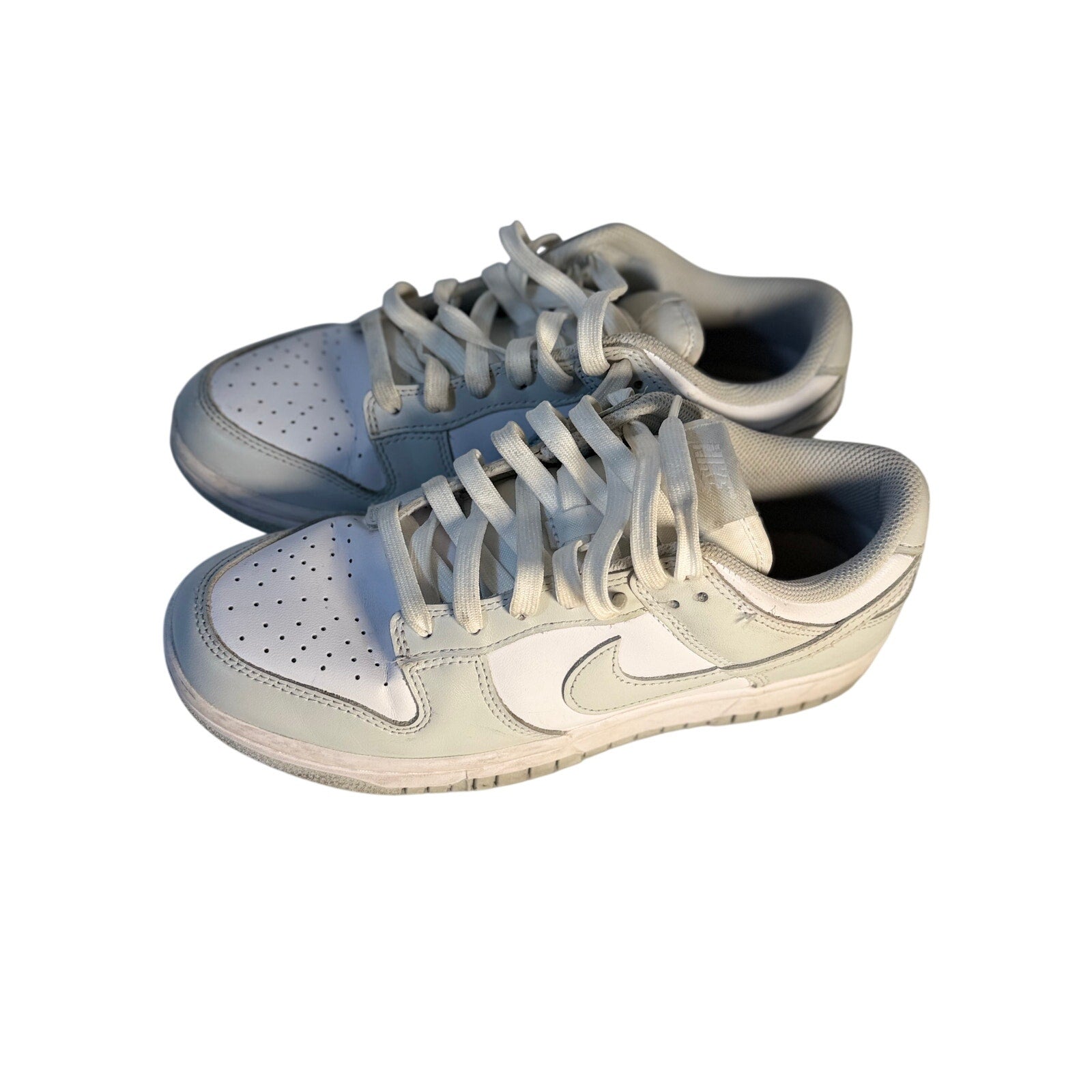 Nike Dunk Low Triple White sneakers for men, size 7.5, featuring white leather casual shoes with a classic low-top design.