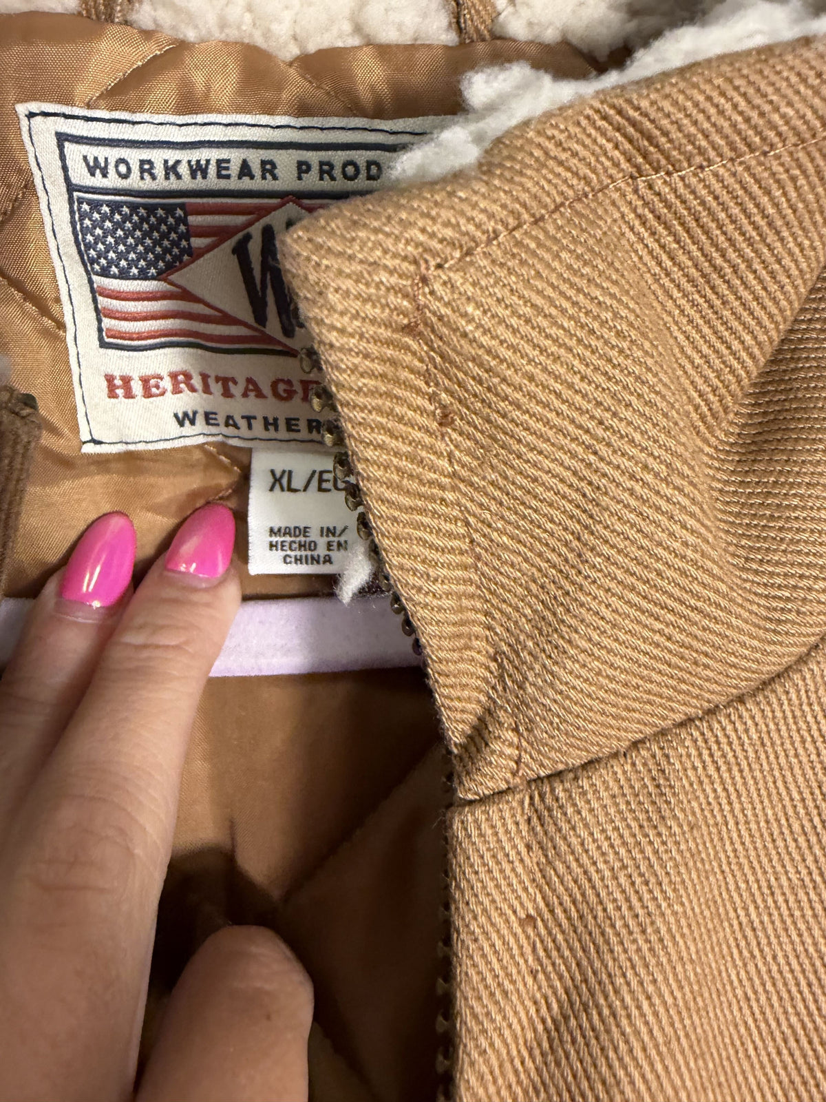 Weatherproof men's tan canvas work vest with Sherpa lining, weatherproof jacket in size XL, designed for durability and warmth.