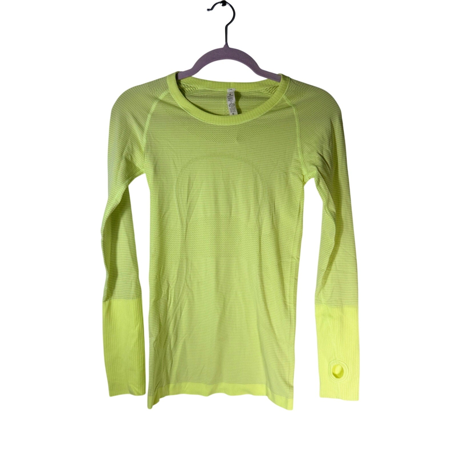 Lululemon Swiftly Tech long sleeve shirt for women, size 4, lightweight athletic tank top in a sleek design.