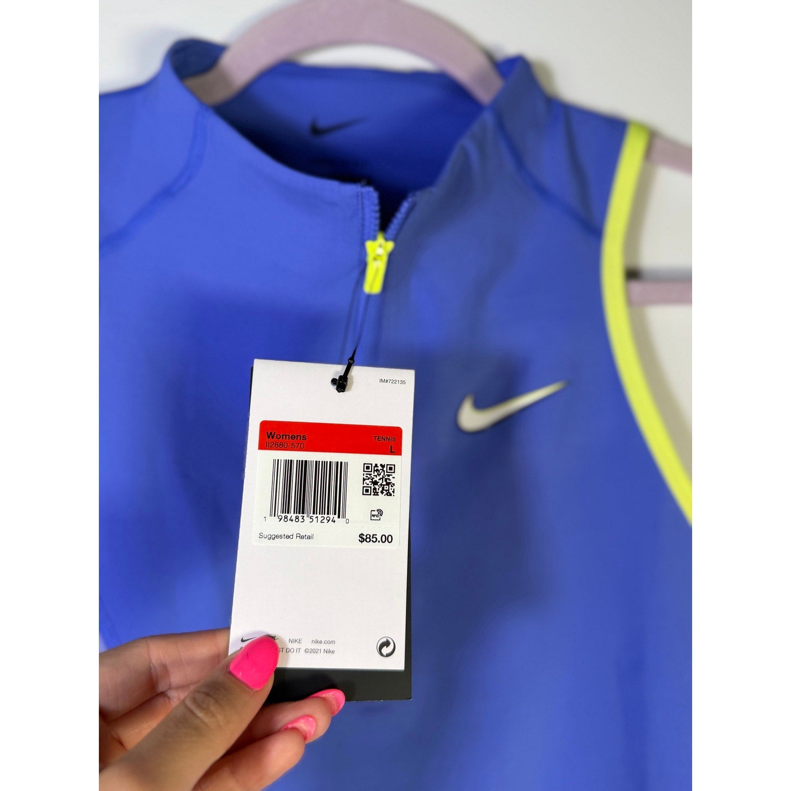 Nike women's blue and yellow quarter-zip cropped tank top, size large, lightweight athletic top with Nike branding.