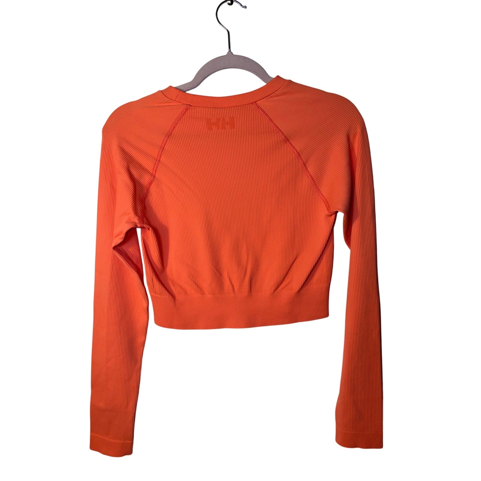 Youth Helly Hansen long sleeve T-shirt in peach, size large, featuring casual fit and soft fabric for comfortable wear.
