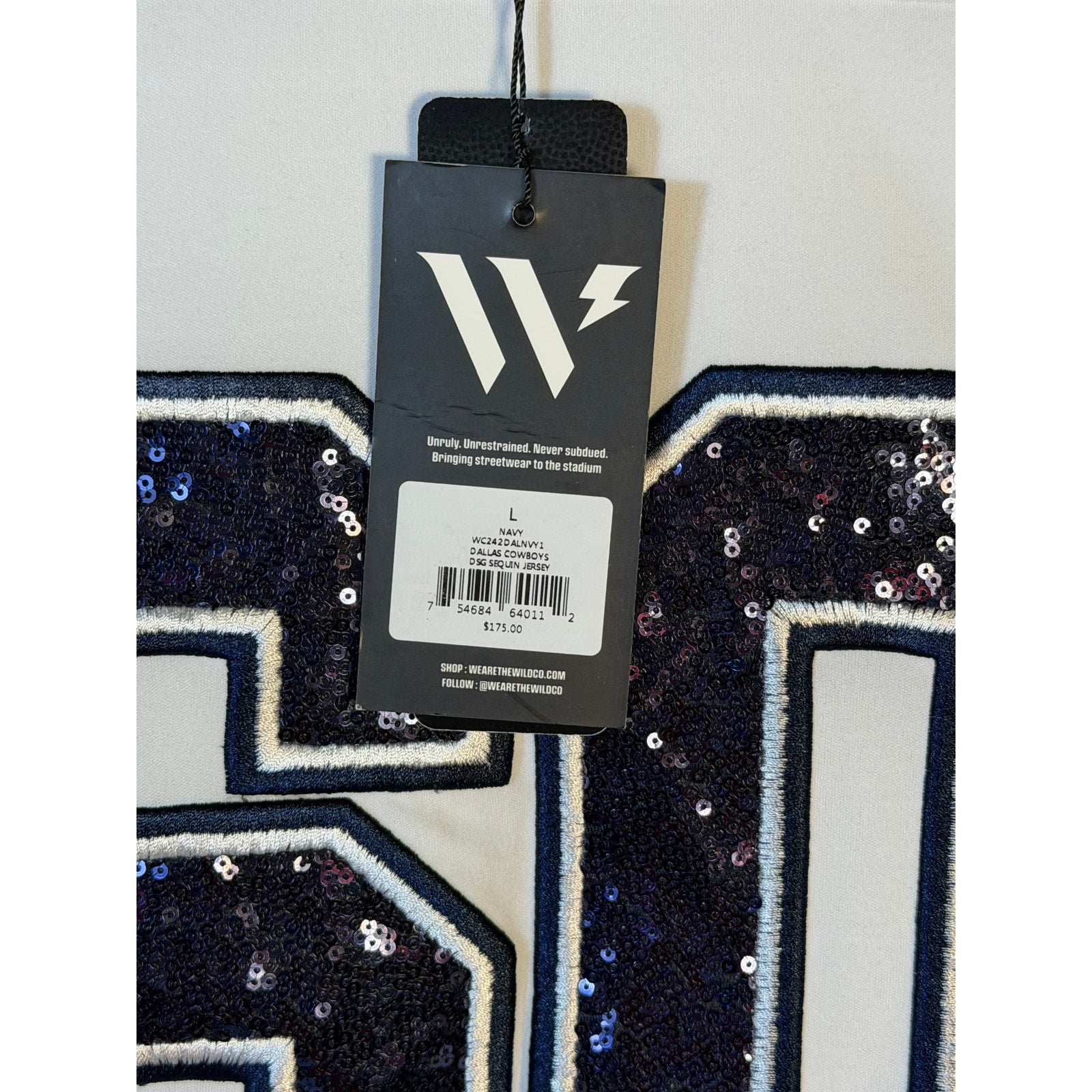 White Dallas Cowboys sequin NFL jersey for women by Wear by Erin Andrews, large size, with visible sequined details and team logo.