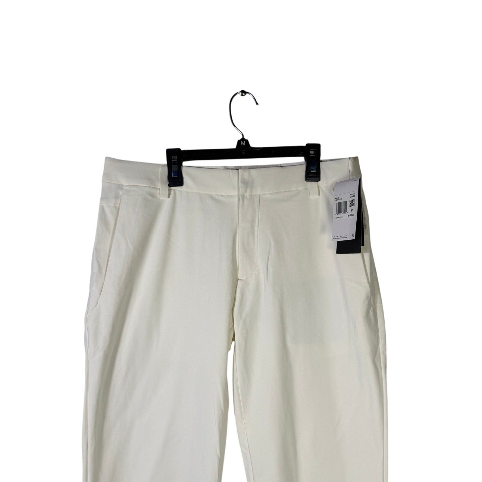 Nike Dri-FIT 24.7 slim fit men's training pants with 5 pockets in white, size 32x30, shown on a hanger.