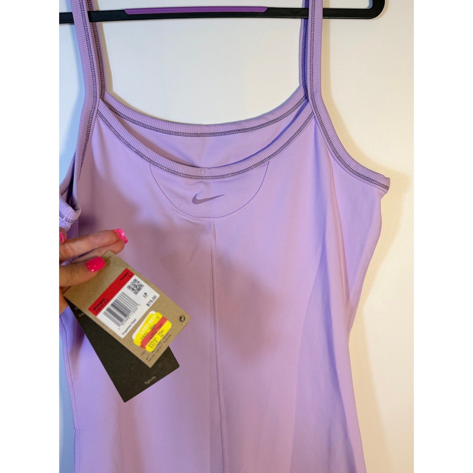 Lavender Nike One Dri-FIT training romper bodysuit for women, large size, shown on a model, athletic and comfortable fit