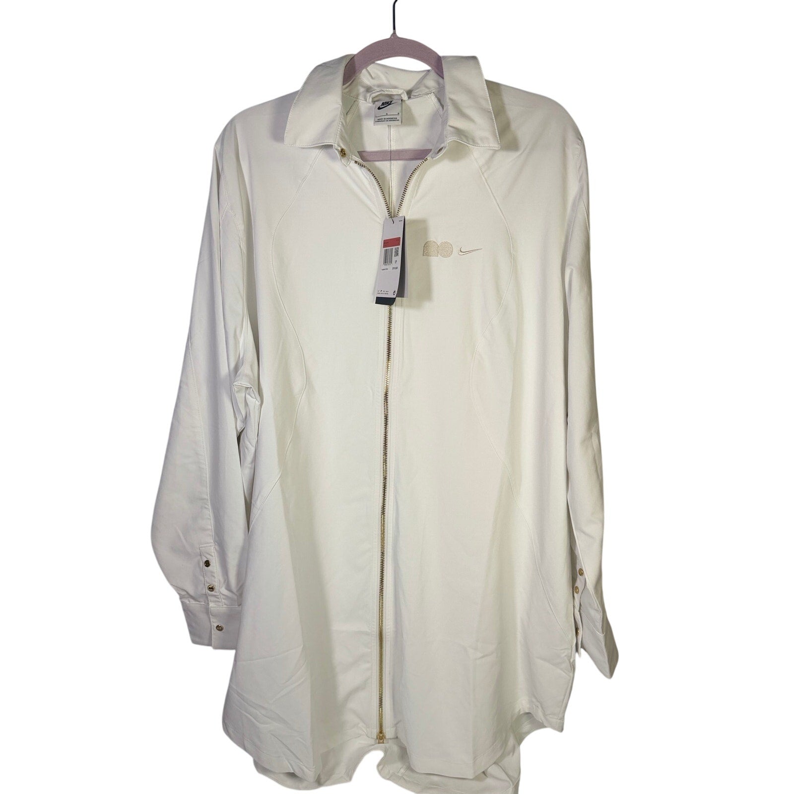 Nike women's full zip jacket in cream with logo, size XL, featuring a front zipper and casual jacket style.