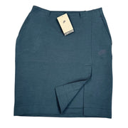 Nike women's slim fit knee-length athletic skirt in small size, lightweight fabric, with adjustable waistband and Nike logo.