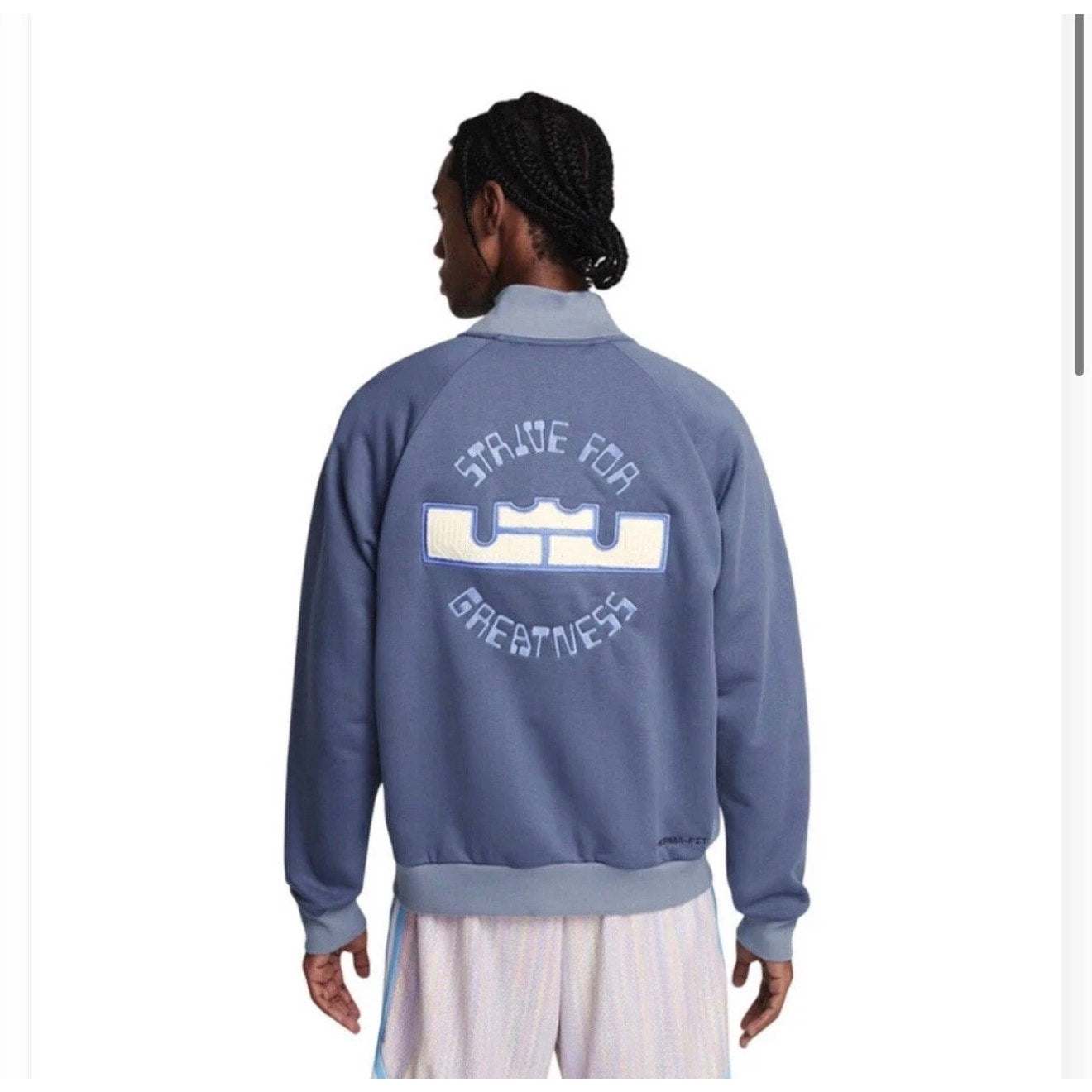 Nike LeBron men's blue basketball bomber jacket with snap buttons, lightweight fleece, and sporty design.