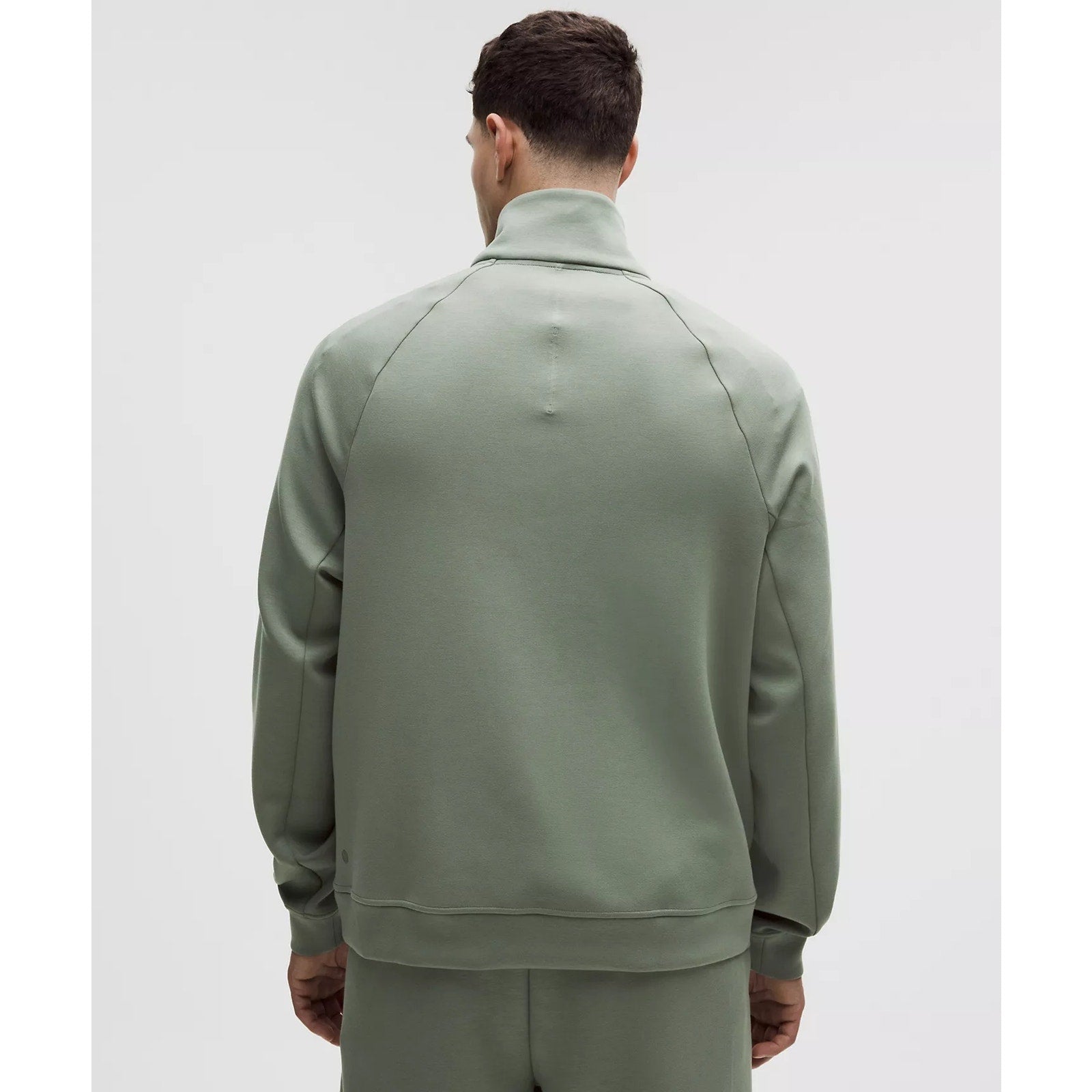 Men's green Lululemon Smooth Spacer Quarter Zip sweatshirt in XXL, showing the quarter zip collar and lightweight fabric.