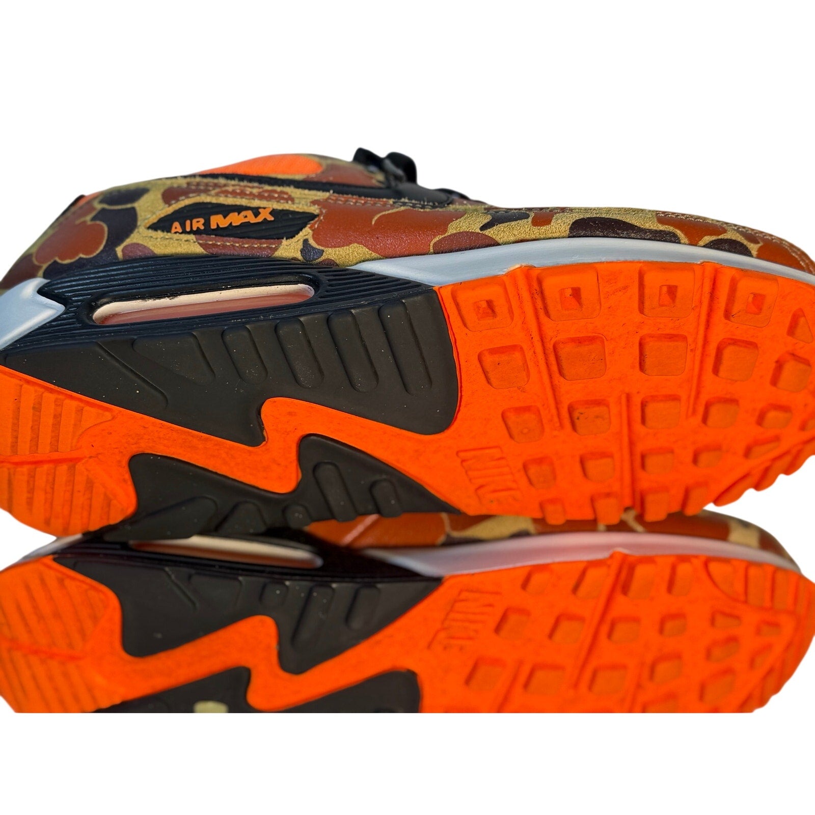 Nike Air Max 90 orange camo and black sneakers for men's size 11, featuring a sporty design and iconic Air Max cushioning.