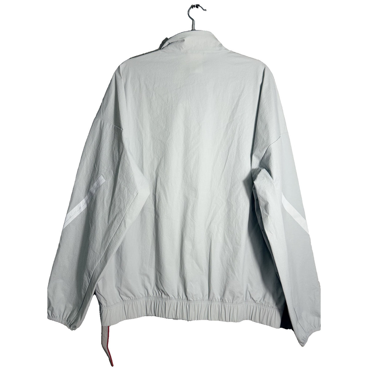 Men's adidas Patrick Mahomes Z.N.E. woven track jacket in clear grey, front view showing lightweight athletic design.