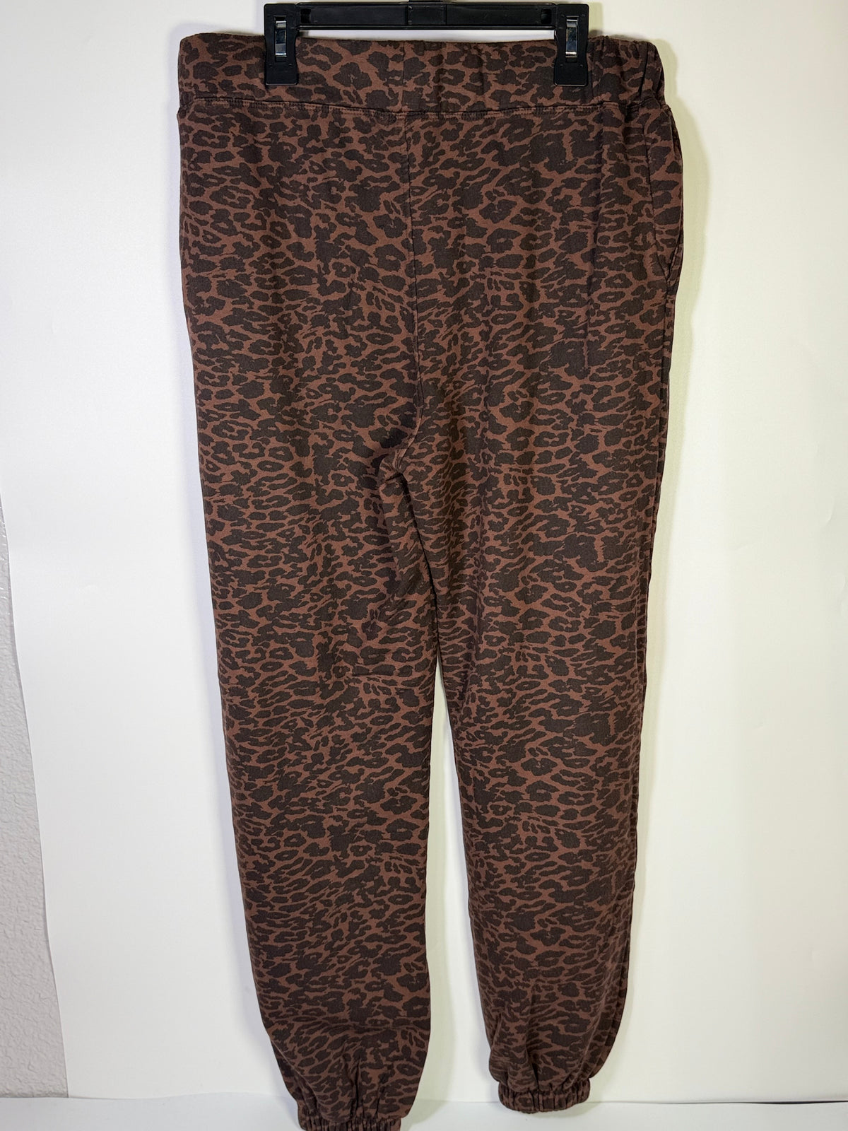 Joe's Sierra animal print jogger pants in brown, size M, featuring a relaxed fit and stylish animal pattern.