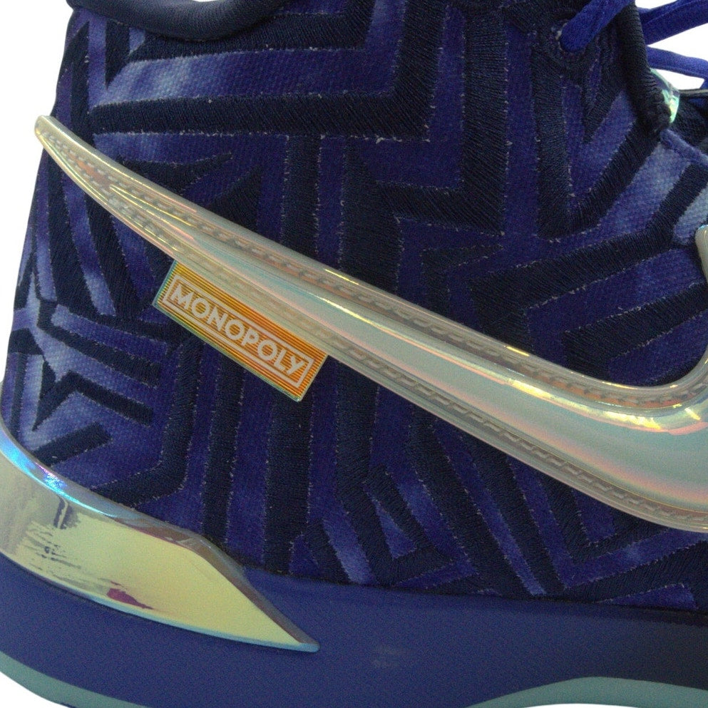 Nike Monopoly X Zoom LeBron NXXT Genesis basketball shoes in Persian Violet, men's size 11, featuring vibrant purple and black design.