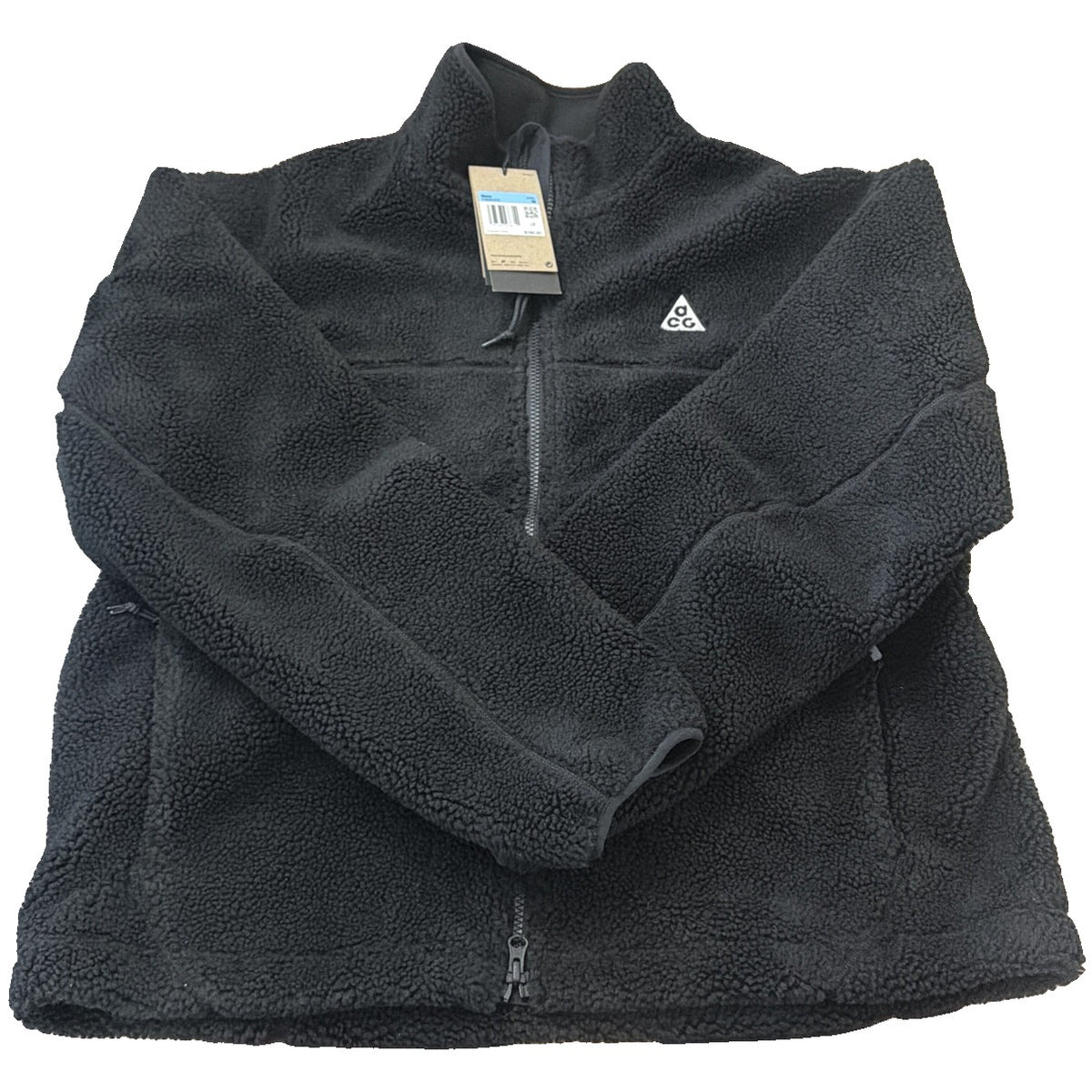 Nike ACG Sherpa Fleece full zip jacket in black, men's size M, featuring a cozy fleece interior and Nike branding.