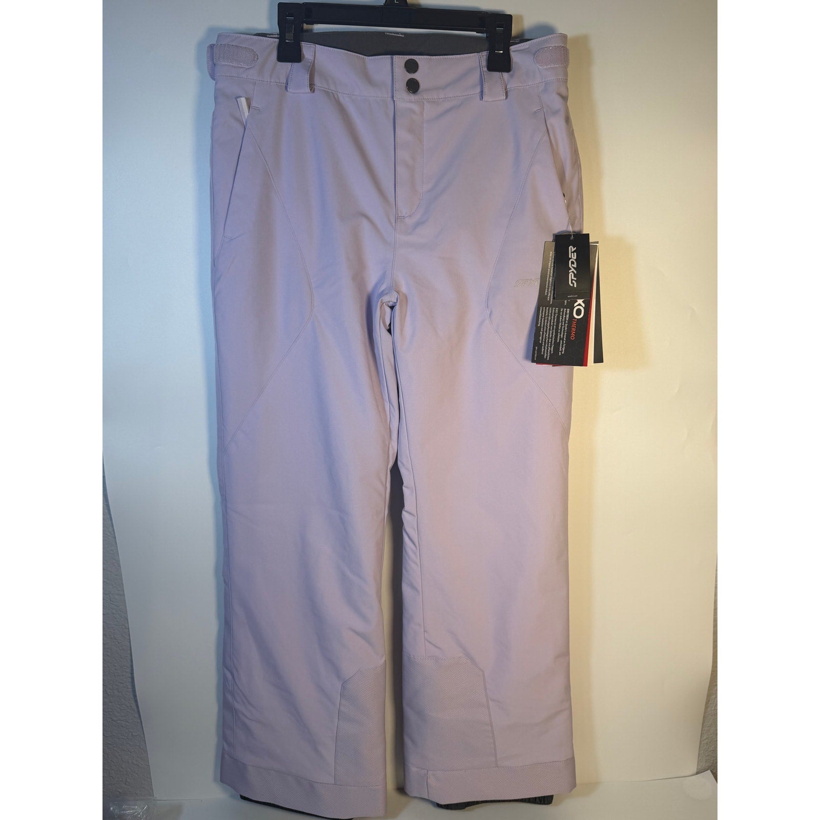 Spyder Women's Olympia ski snow pants in lavender, size 16, with EXO Tech and Thermo insulation, displayed as leggings.