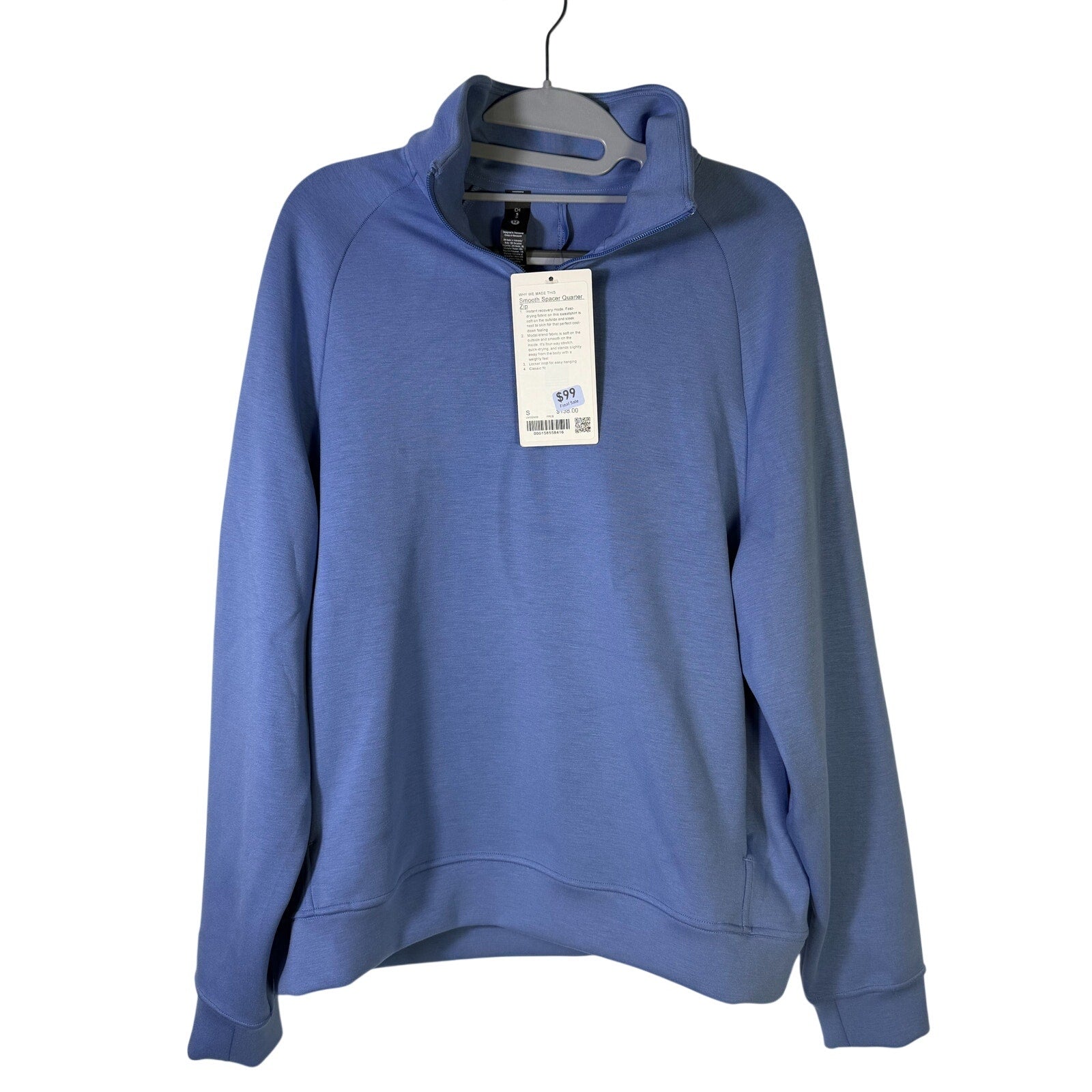 Men's blue Lululemon Smooth Spacer quarter zip sweatshirt, small size, showing the textured fabric and quarter zip closure.