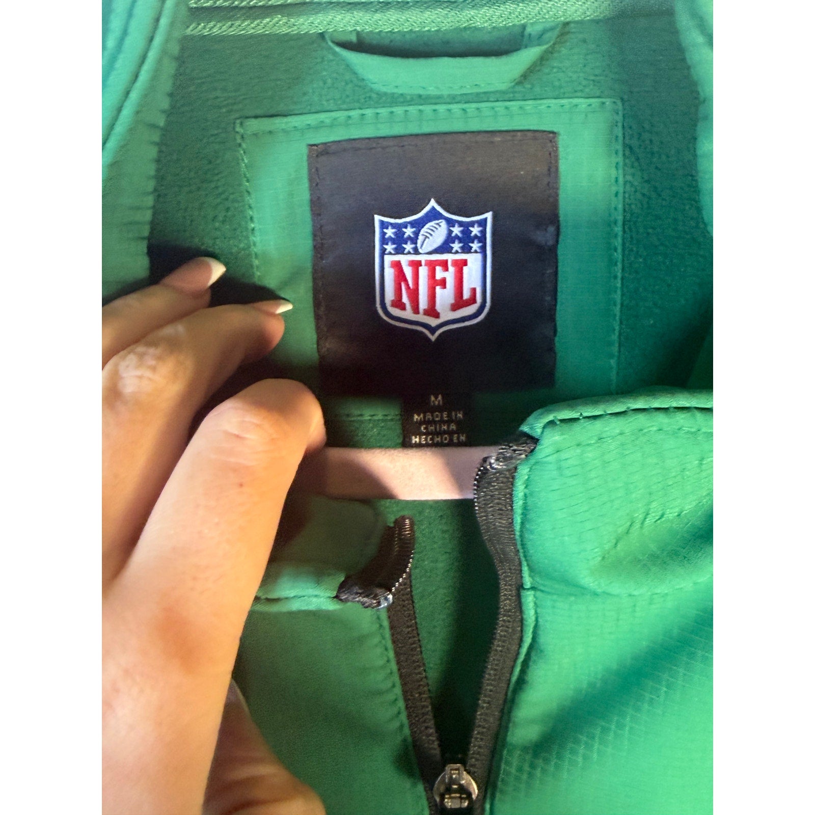 NFL New York Jets women's full zip jacket in green and gray, medium size, team apparel with NFL Team Apparel branding.