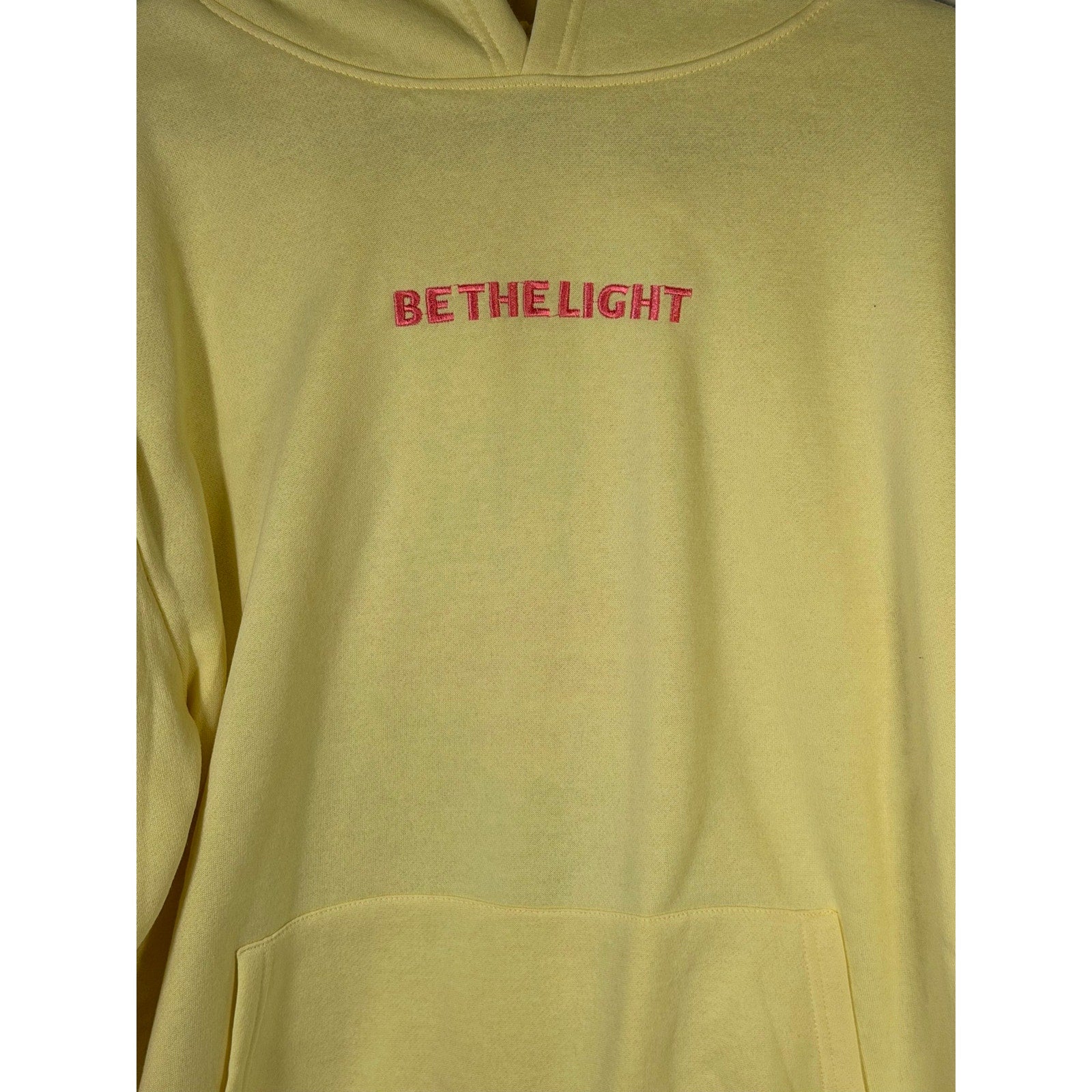 Faded Rose Be The Light Matthew 5:16 yellow Christian hoodie, large size, featuring inspirational text and a comfortable hoodie design.