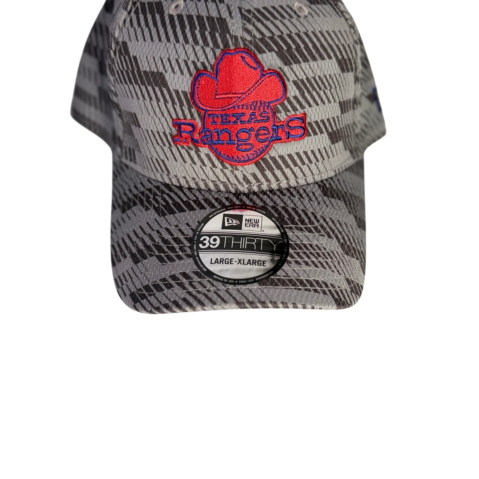 New Era Texas Rangers gray camo 39THIRTY flex fit hat in large/extra-large size, MLB cap, front logo and curved brim.