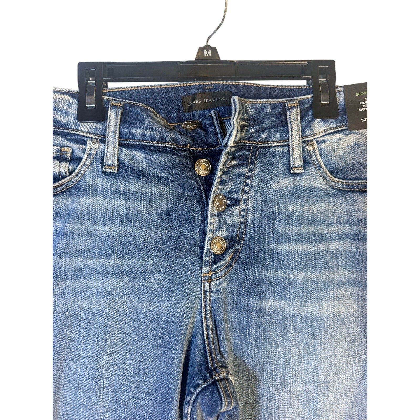 Silver Jeans Co. Suki curvy fit mid-rise skinny crop jeans for women, size 14W, shown on a model.