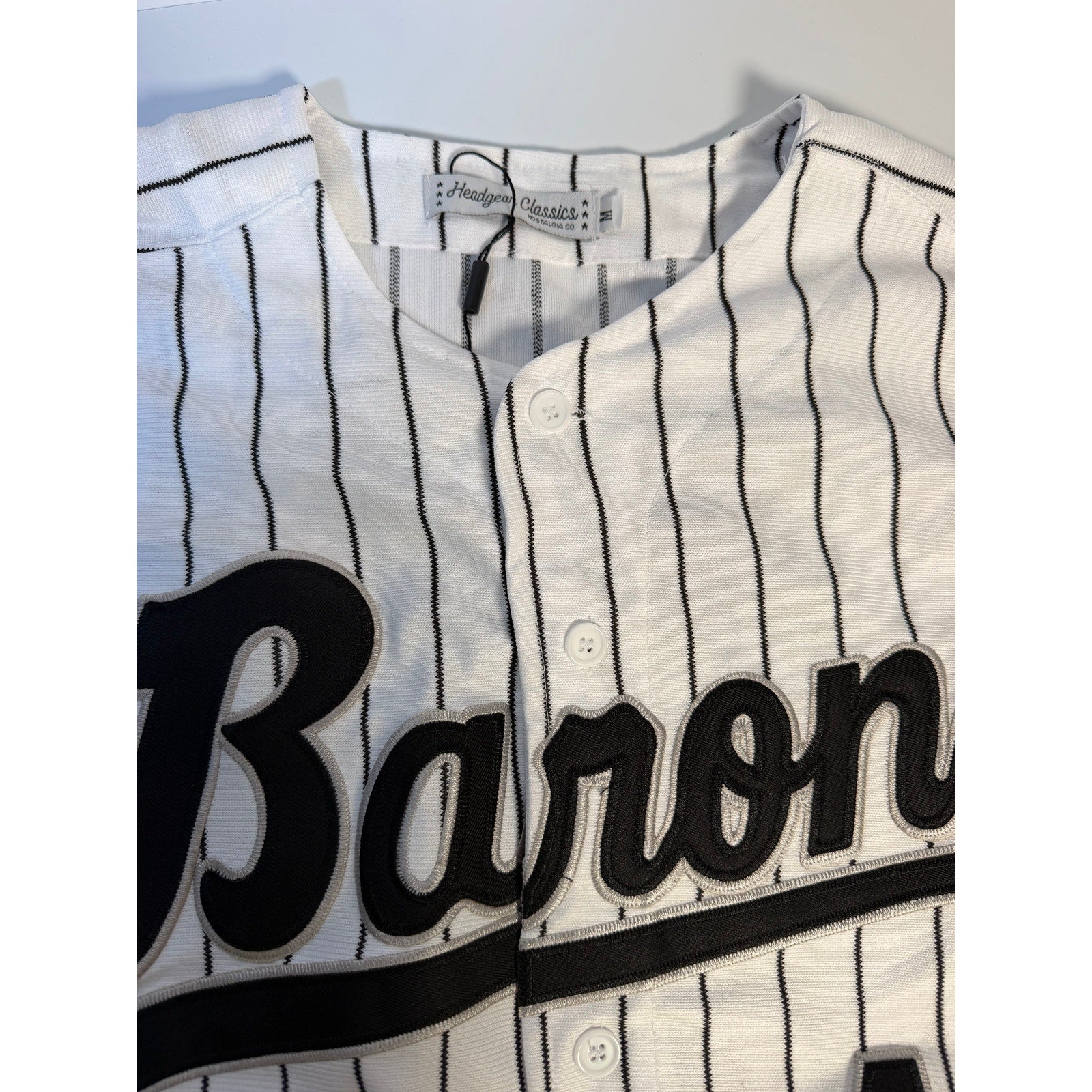 Men's XL Headgear Classics Birmingham Barons Michael Jordan #45 jersey with team logo and player number on white fabric.