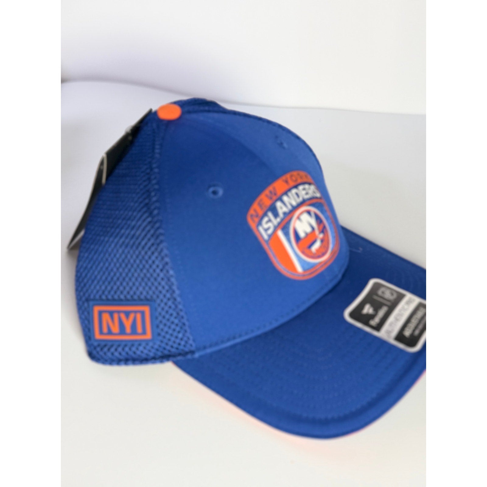 Fanatics New York Islanders authentic blue mesh adjustable pro hat with team logo and structured brim.